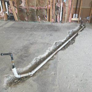 concrete trenching for plumbing relocation